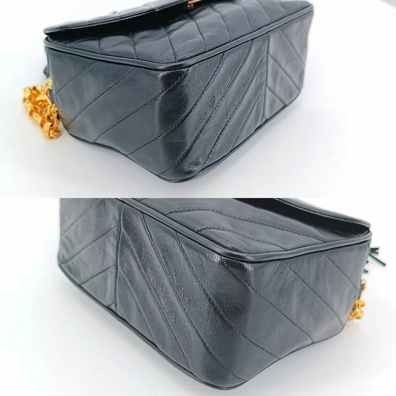 ra067-chanel-vintage-black-lambskin-tassels-gold-chain-camera-bag
