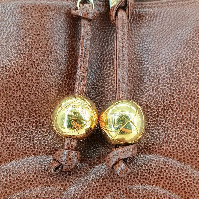 rb181-chanel-vintage-brown-caviar-leather-embroidered-logo-golden-ball-tote-bag