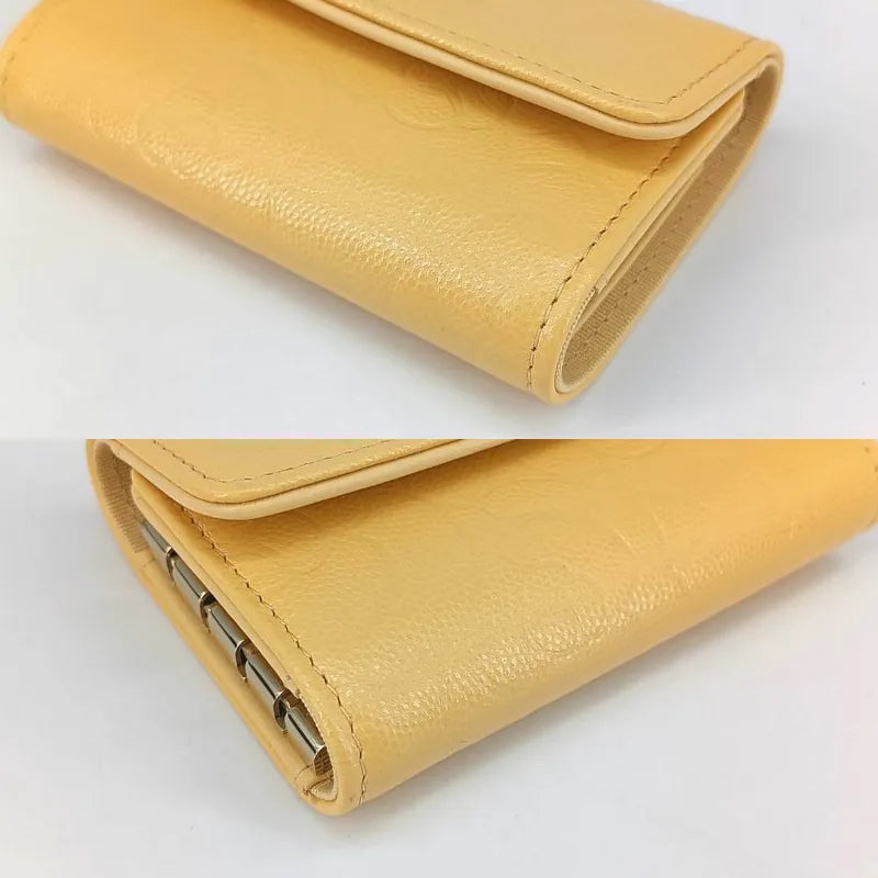jt400-chanel-yellow-caviar-leather-camellia-flap-4-key-holder