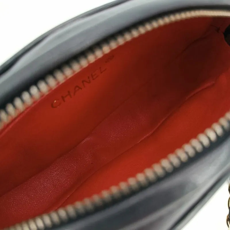js561-chanel-vintage-black-satin-oval-camera-bag