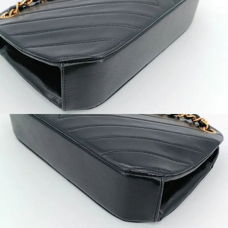 js707-chanel-vintage-black-lambskin-chevron-handbag