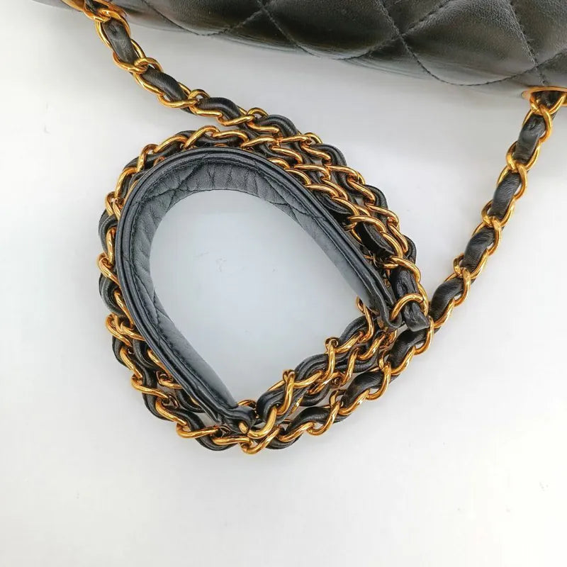 jah125-chanel-vintage-black-lambskin-quilted-flap-bag