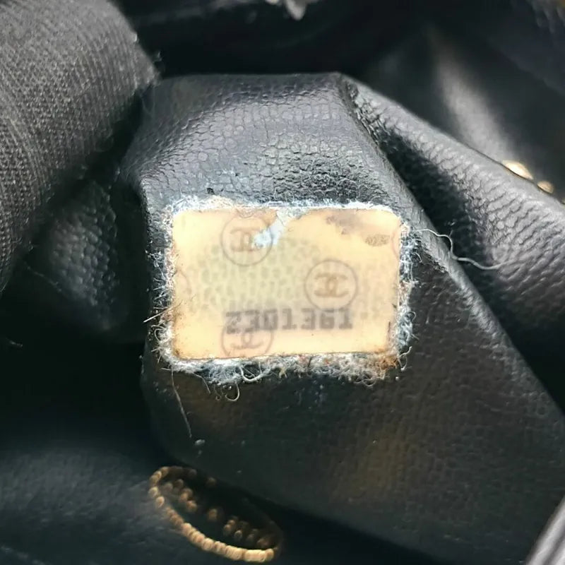 c457-chanel-vintage-black-caviar-leather-golden-ball-mini-bucket-bag