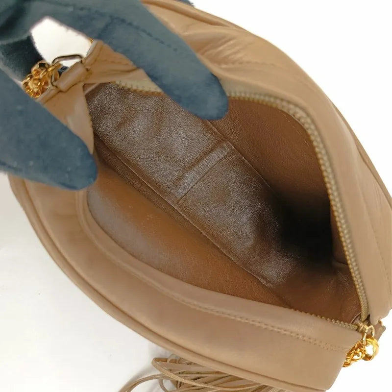 jah109-chanel-vintage-beige-lambskin-tassels-gold-chain-camera-bag