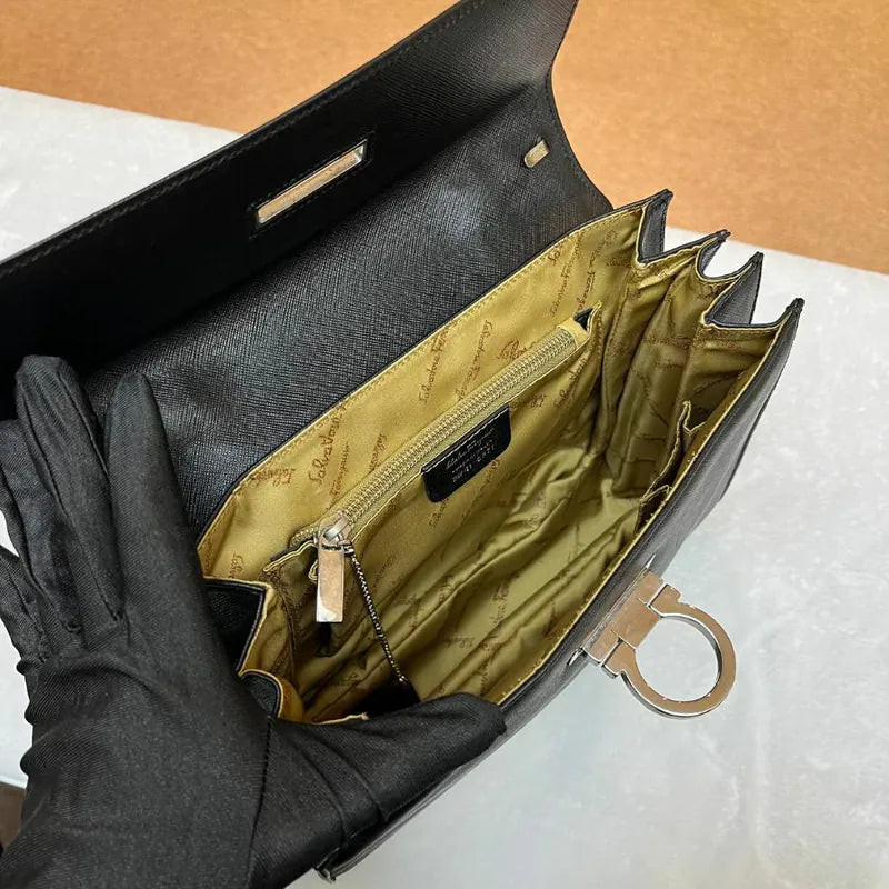 jx305-salvatore-ferragamo-vintage-black-leather-gancini-hand-bag