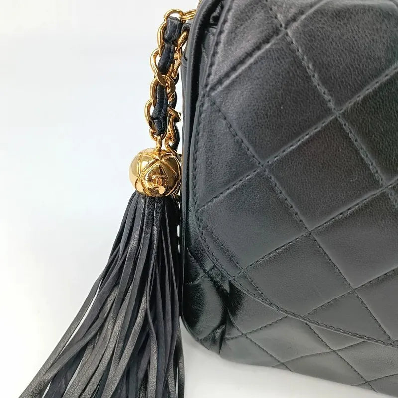 c354-chanel-vintage-black-lambskin-tassel-camera-bag