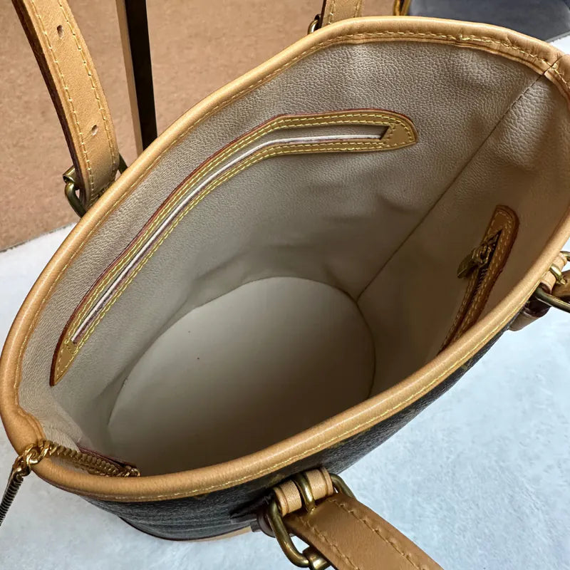 jw236-louis-vuitton-vintage-petite-monogram-bucket-bagrepaired-item