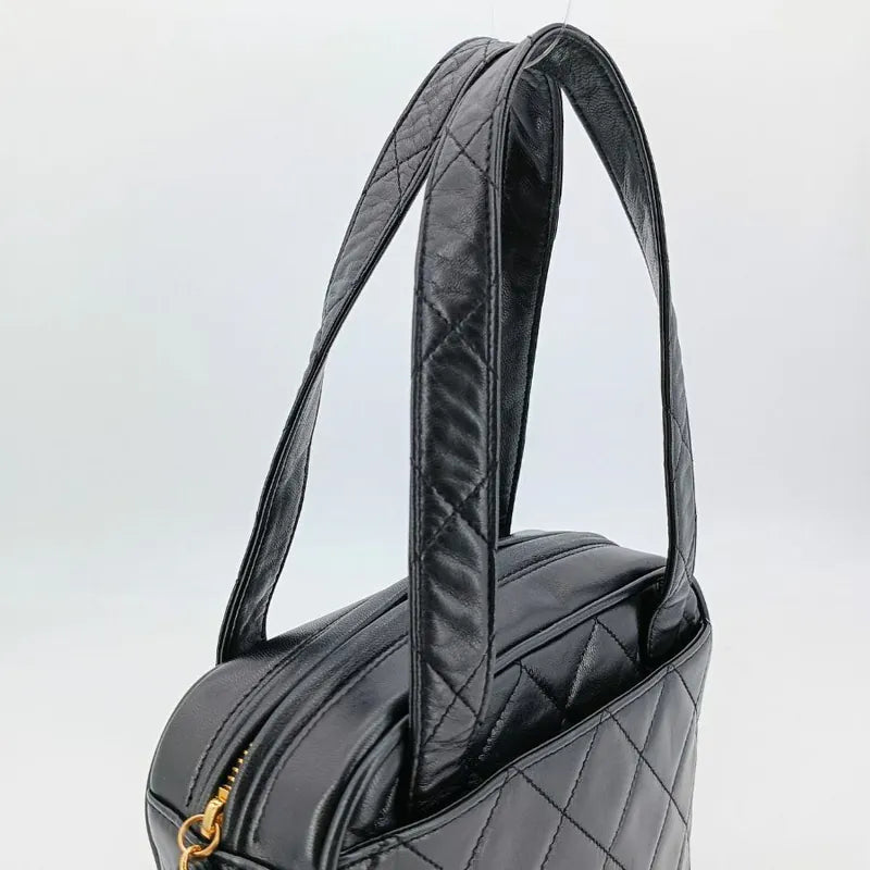 ra717-chanel-vintage-black-lambskin-quilted-handbag