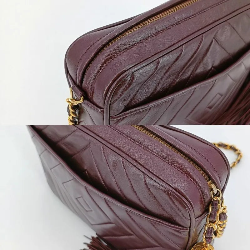 jt296-chanel-vintage-burgundy-lambskin-tassel-camera-bag