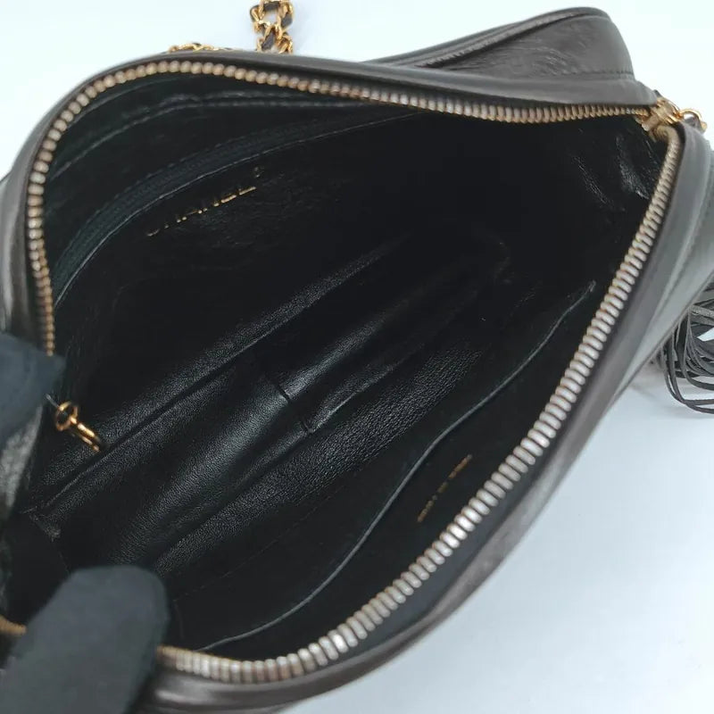 jt075-chanel-vintage-black-lambskin-tassel-camera-bag