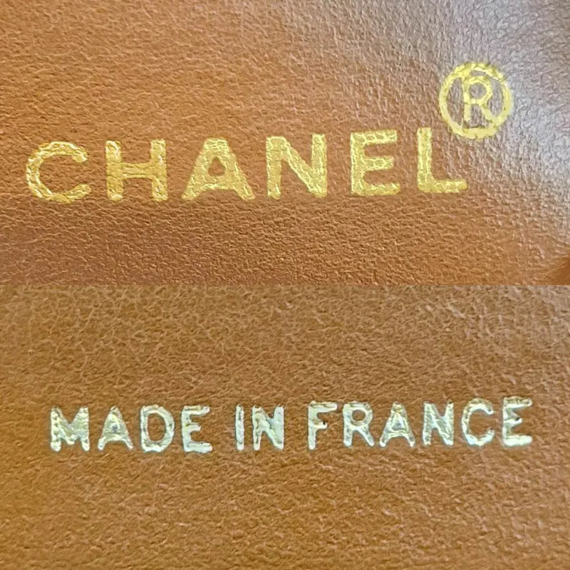 rb181-chanel-vintage-brown-caviar-leather-embroidered-logo-golden-ball-tote-bag