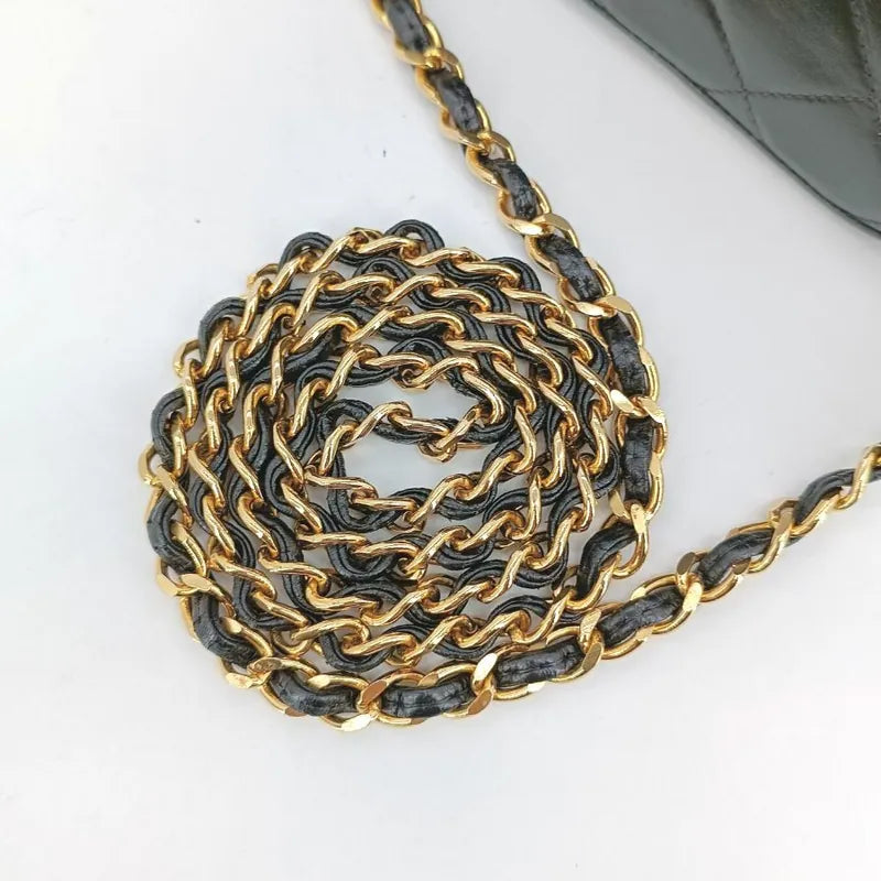 c414-chanel-vintage-black-lambskin-tassels-bucket-bag