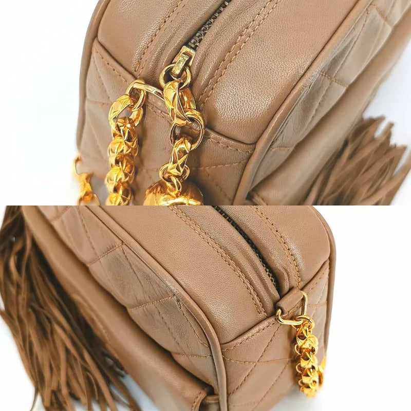 ra234-chanel-vintage-beige-lambskin-tassels-gold-chain-camera-bag