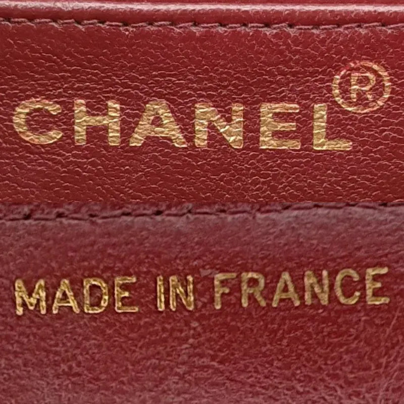 ju702-chanel-vintage-black-lambskin-cross-stripe-flap-bag