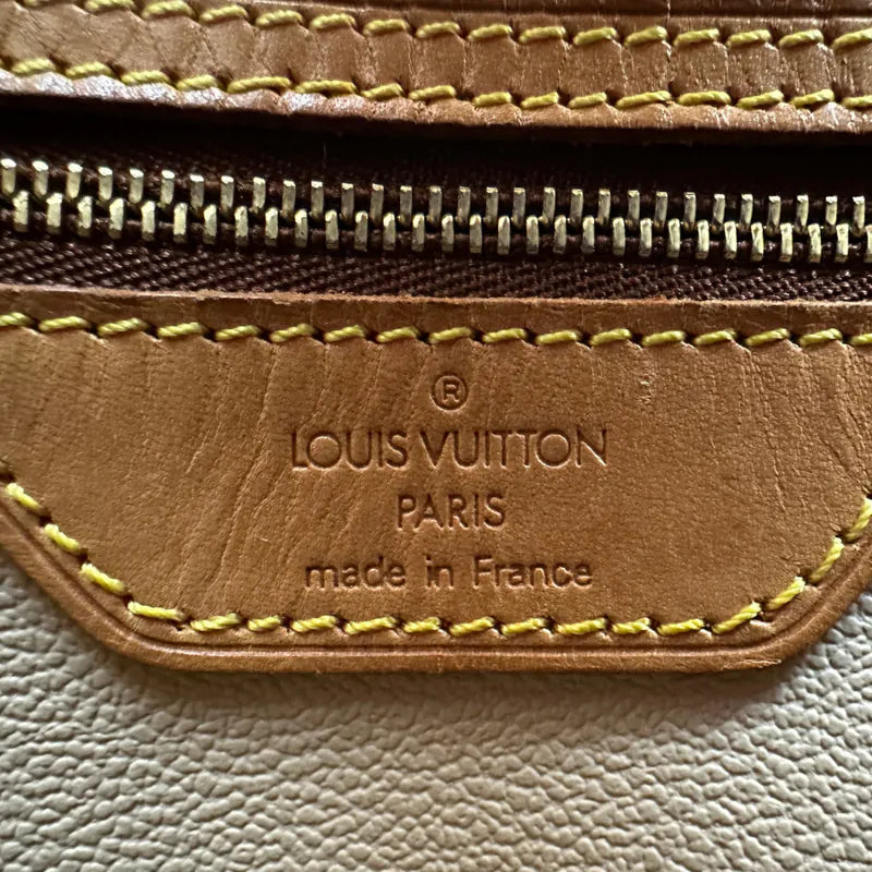 jw236-louis-vuitton-vintage-petite-monogram-bucket-bagrepaired-item