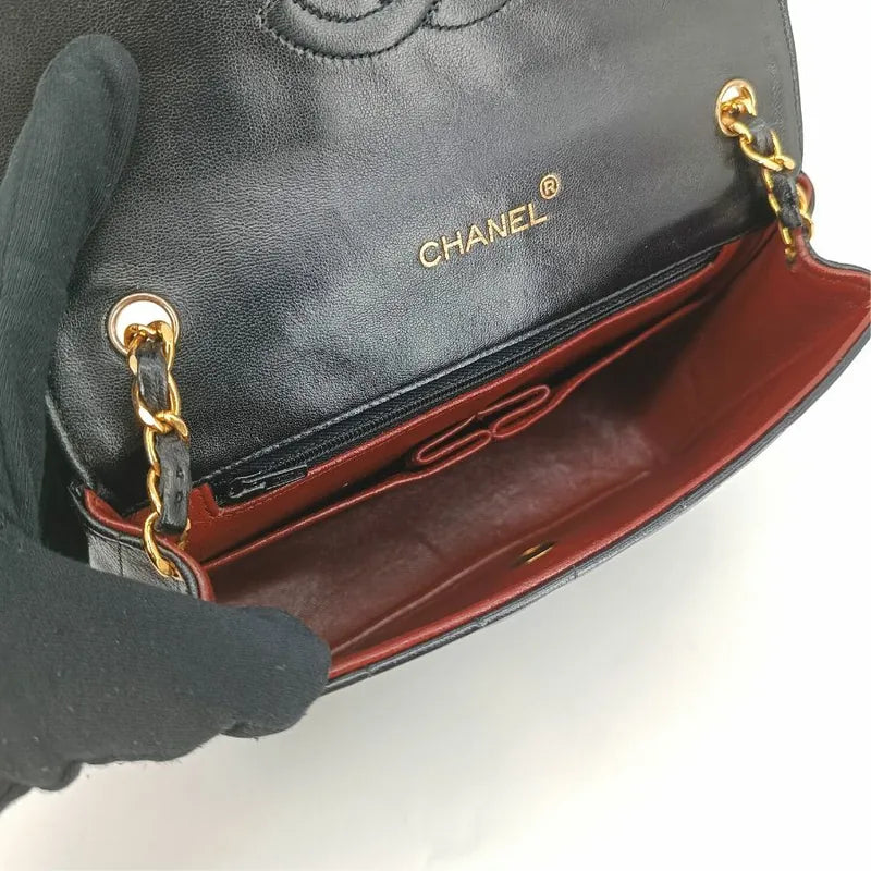 jt341-chanel-vingate-black-lambskin-spiral-flap-bag