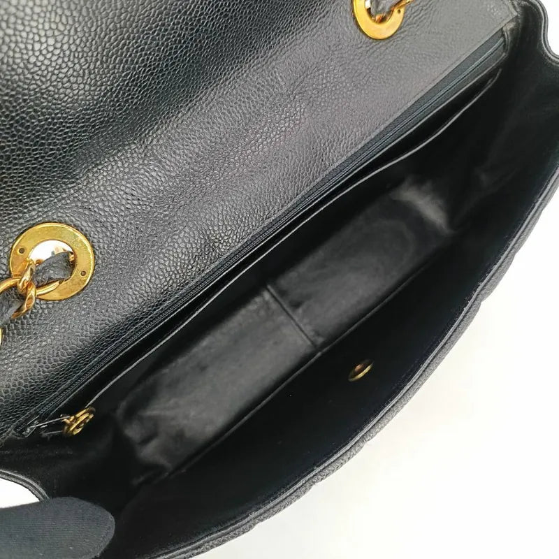 c377-chanel-vintage-black-caviar-leather-vertical-jumbo-flap-bag