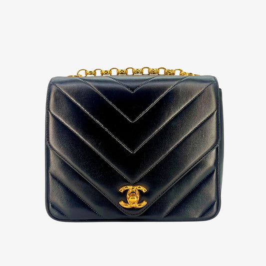 90273084 - CHANEL Vintage Black Lambskin Chevron Gold Chain Flap Bag