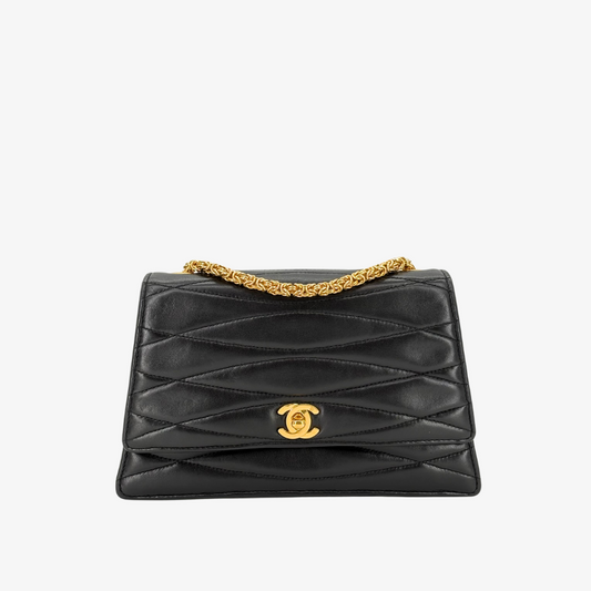 RG718 - CHANEL Vintage Black Lambskin Wave Stitch Flap Bag