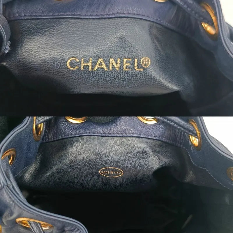 jah154-chanel-vintage-navy-lambskin-gold-ball-bucket-bag