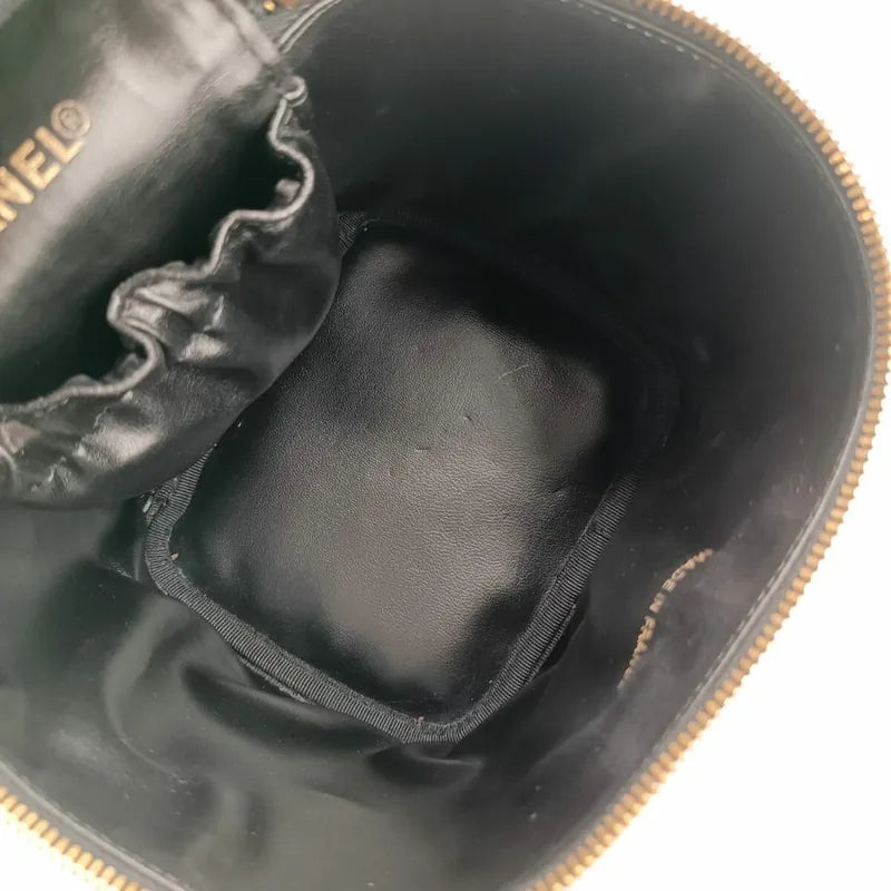 jah147-chanel-vintage-black-caviar-leather-cosmetic-bag