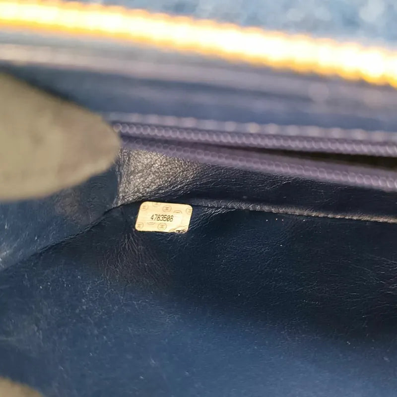 90129699-chanel-vintage-blue-denim-flap-backpack