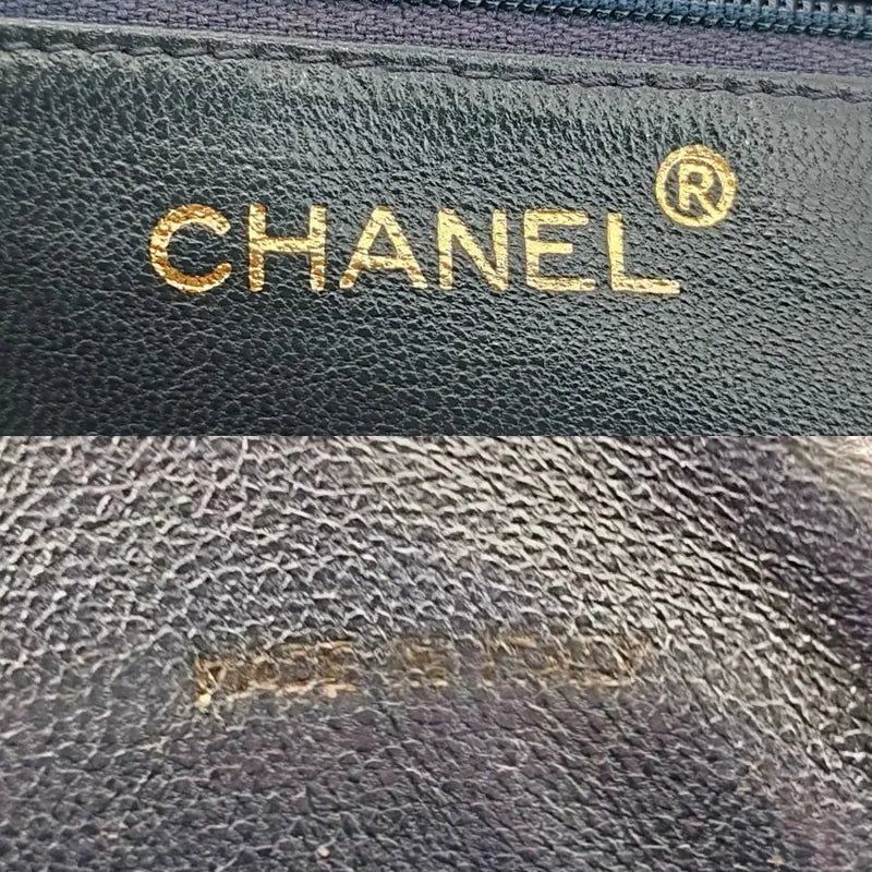 jw070-chanel-vintage-navy-lambskin-tassel-camera-bag
