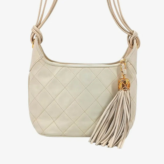 jah165-chanel-vintage-beige-lambskin-quilted-camera-bag