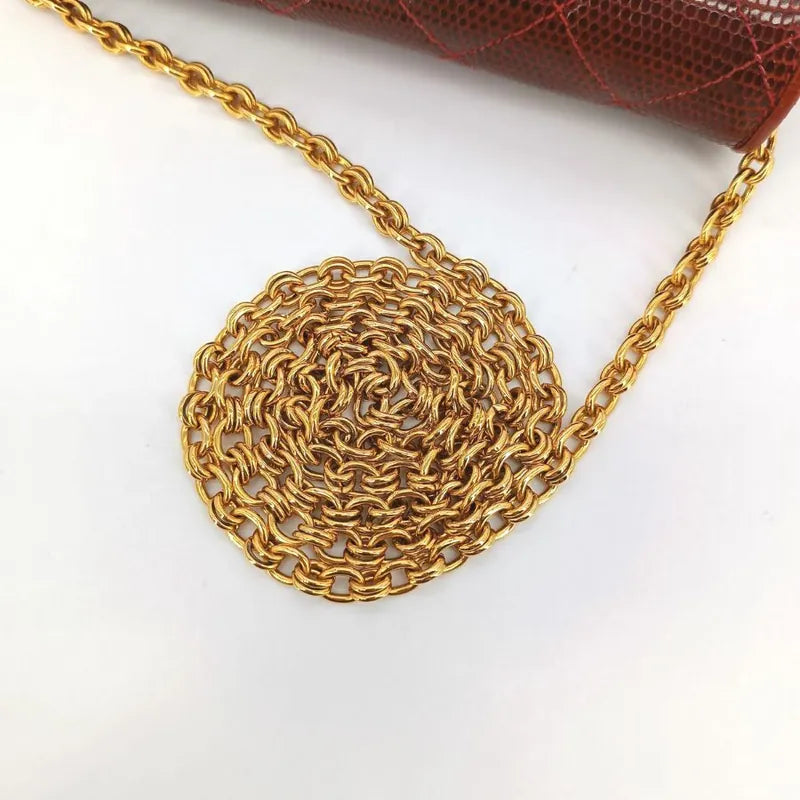 c426-chanel-vintage-burgundy-lizard-skin-gold-chain-flap-bag