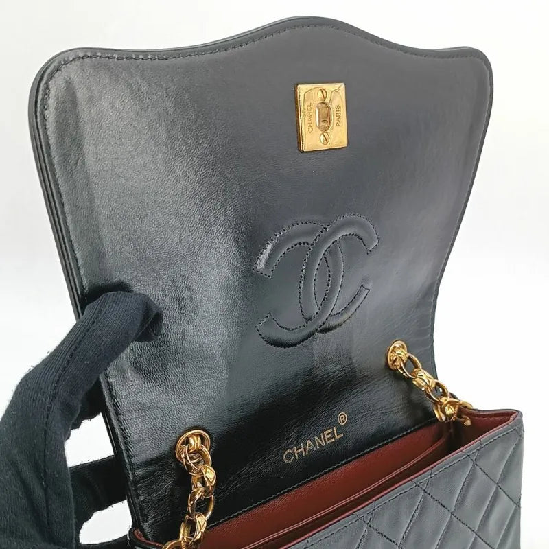 jt704-chanel-vintage-black-lambskin-gold-chain-flap-bag