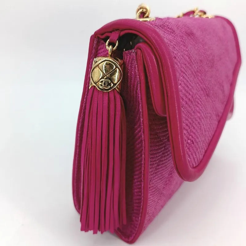 ra444-chanel-vintage-pink-raffia-asymmetric-flap-bag