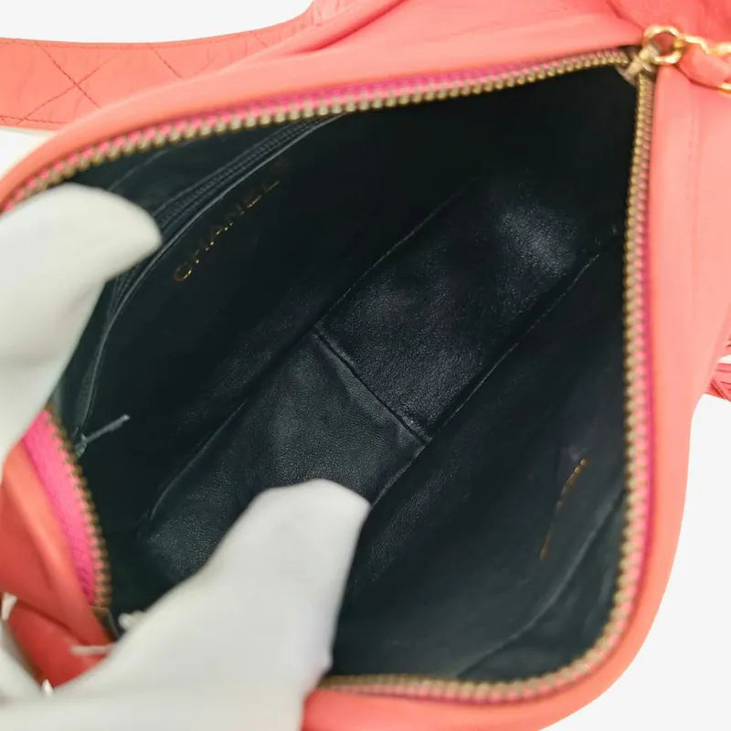 ju999-chanel-vintage-coral-lambskin-tassel-camera-bag