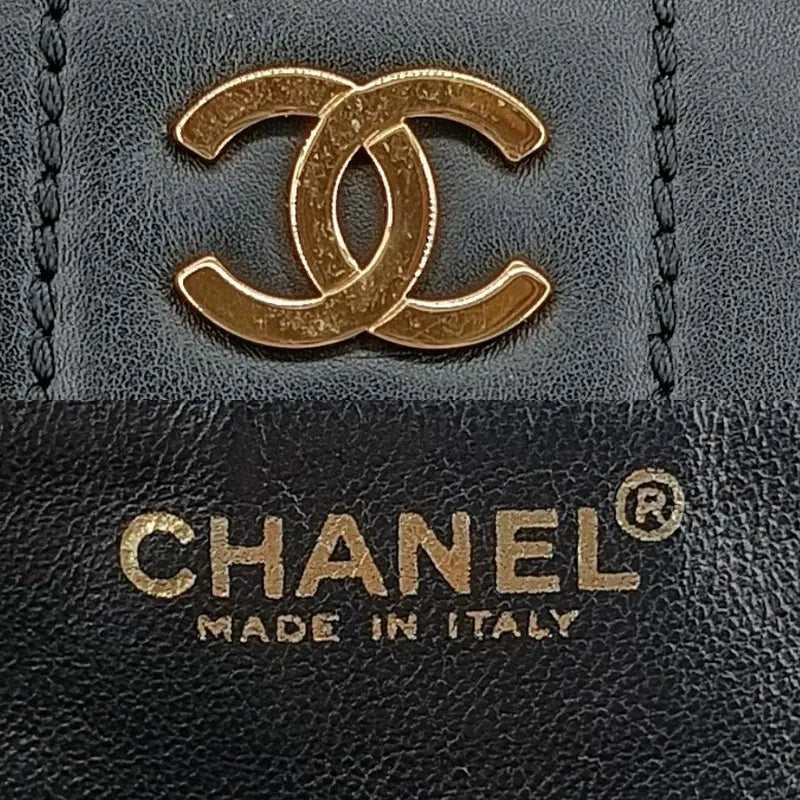 jt731-chanel-vintage-black-calfskin-chocolate-bar-tote-bag