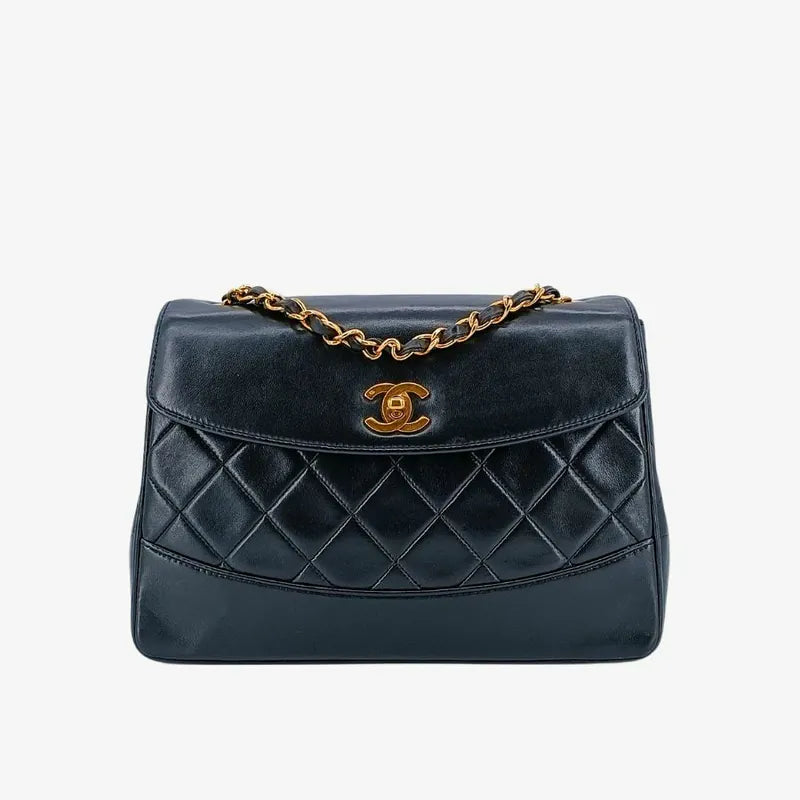 90227492-chanel-vintage-black-lambskin-trapezoid-flap-bag