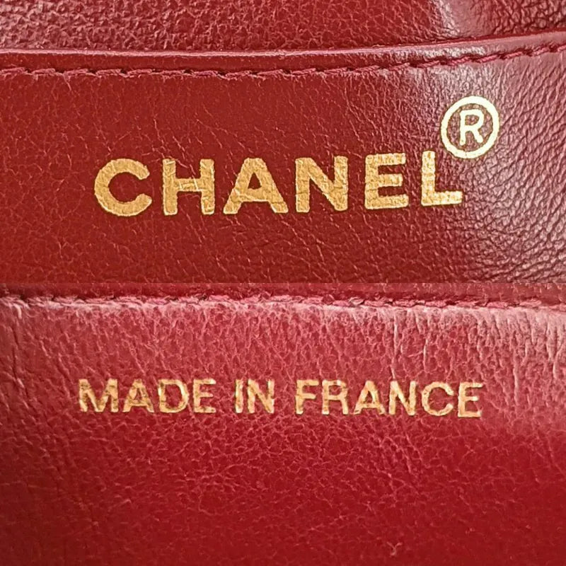 jt941-chanel-vintage-black-lambskin-gold-chain-flap-bag