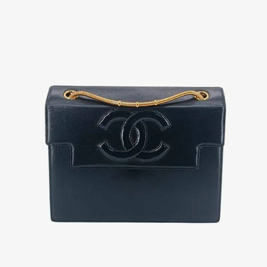 90239780-chanel-vintage-black-lambskin-flap-bag