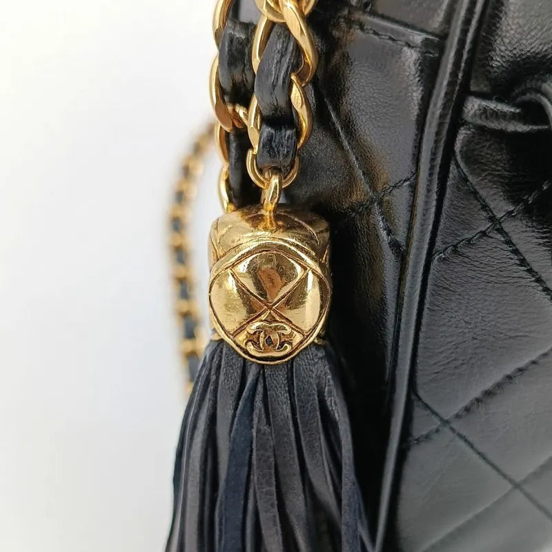 js916-chanel-vintage-black-lambskin-tassel-camera-bag
