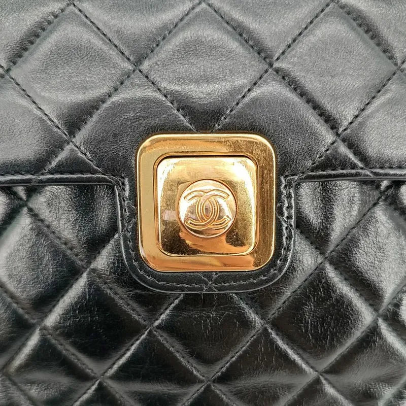 c316-chanel-vintage-black-lambskin-push-lock-flap-bag