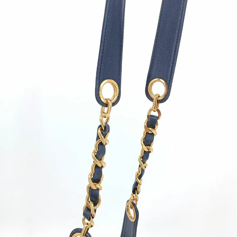 jah154-chanel-vintage-navy-lambskin-gold-ball-bucket-bag