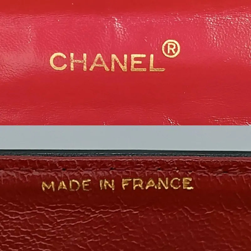 ra355-chanel-vintage-black-lambskin-half-moon-vertical-flap-bag
