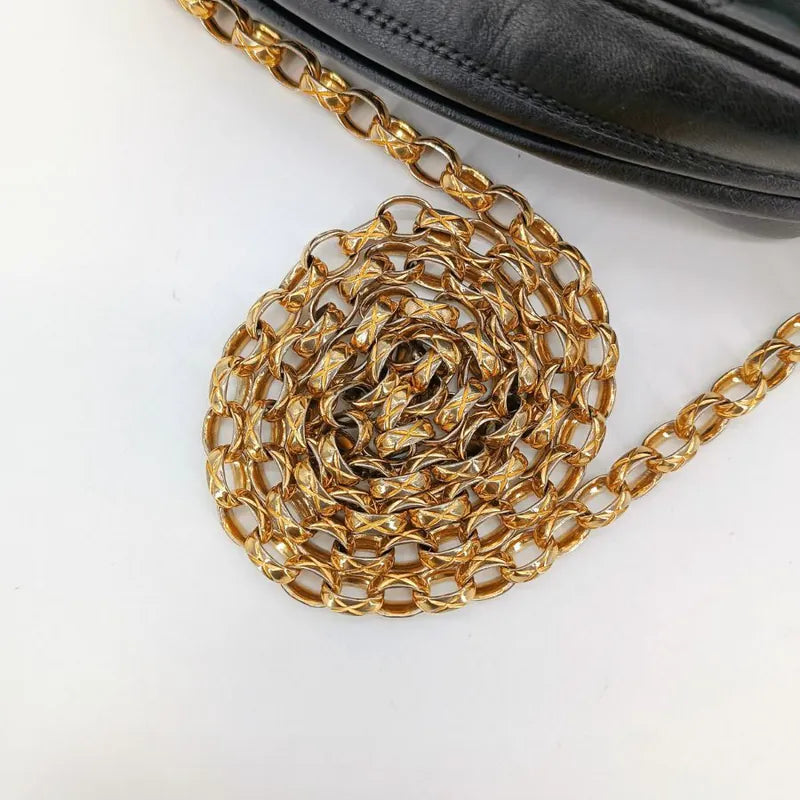 jah158-chanel-vintage-black-lambskin-tassels-gold-chain-camera-bag