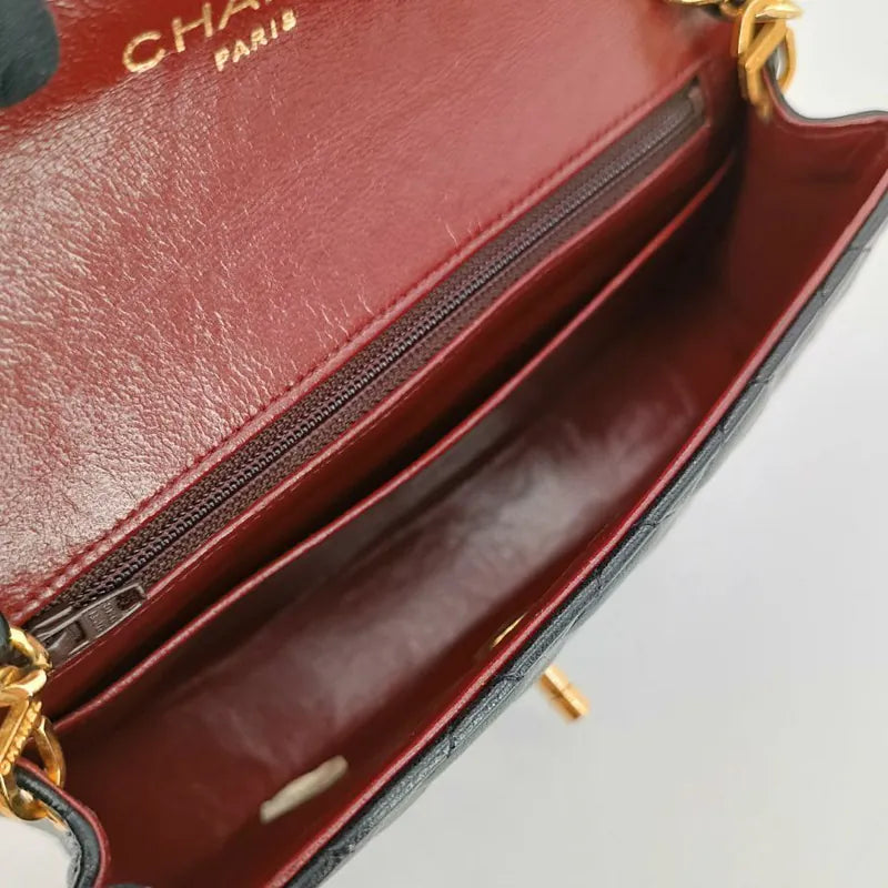 ju431-chanel-vintage-black-lambskin-half-moon-flap-bag