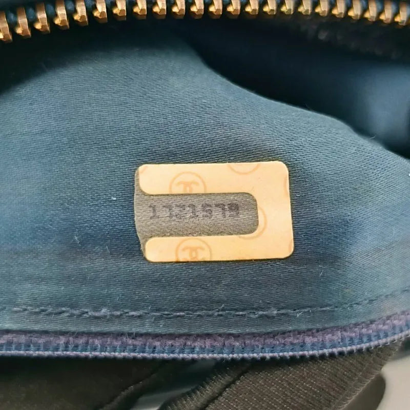 jw070-chanel-vintage-navy-lambskin-tassel-camera-bag