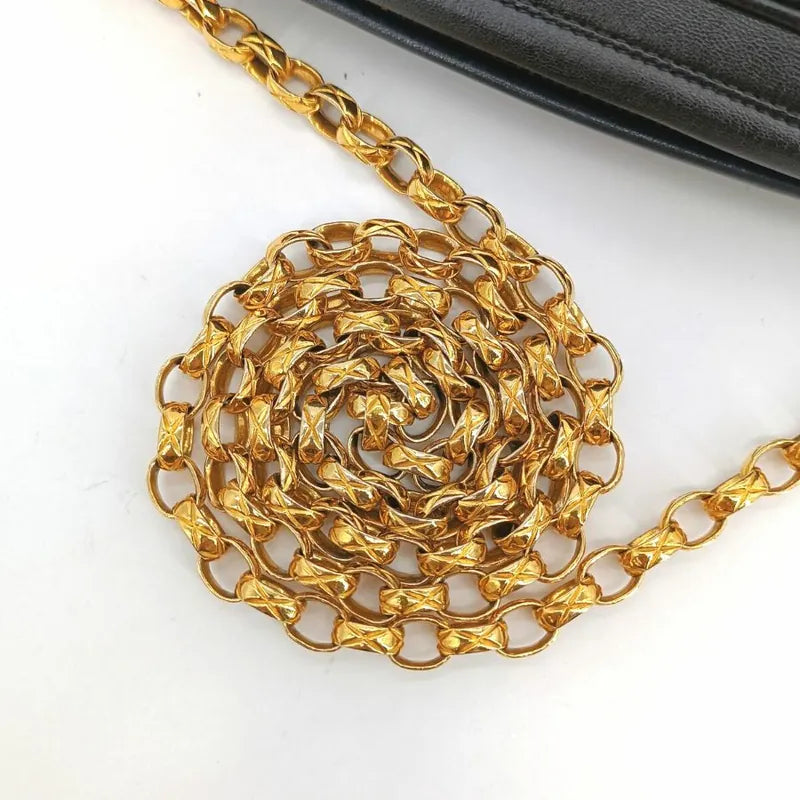 jt788-chanel-vintage-black-lambskin-gold-chain-camera-bag