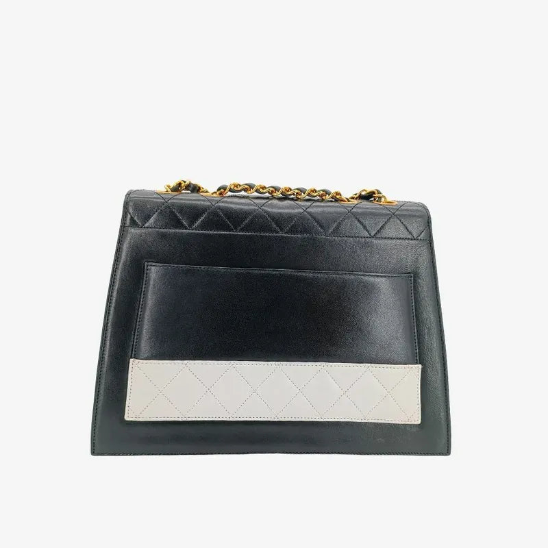 js323-chanel-vintage-bicolor-black-white-255-lambskin-trapezoid-flap-bag