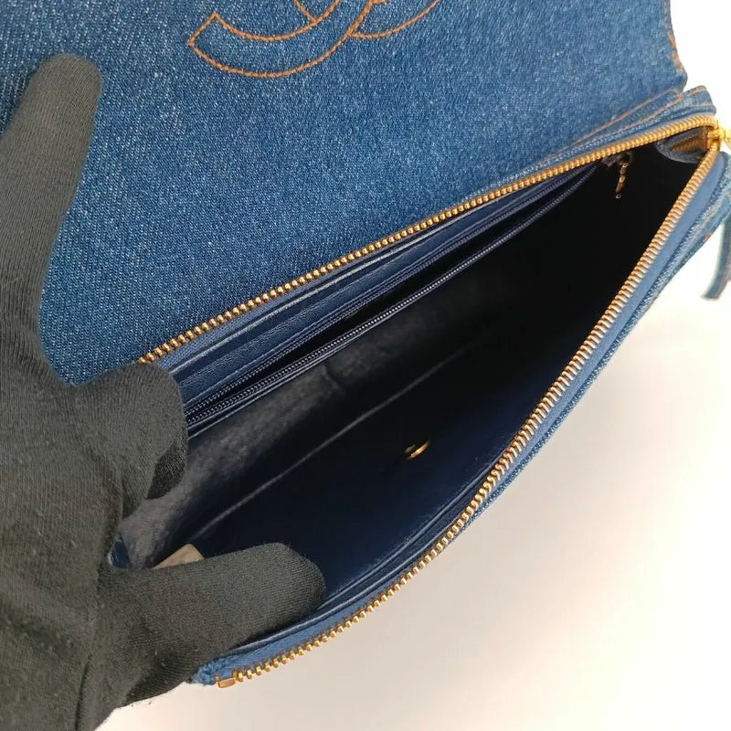 90129699-chanel-vintage-blue-denim-flap-backpack