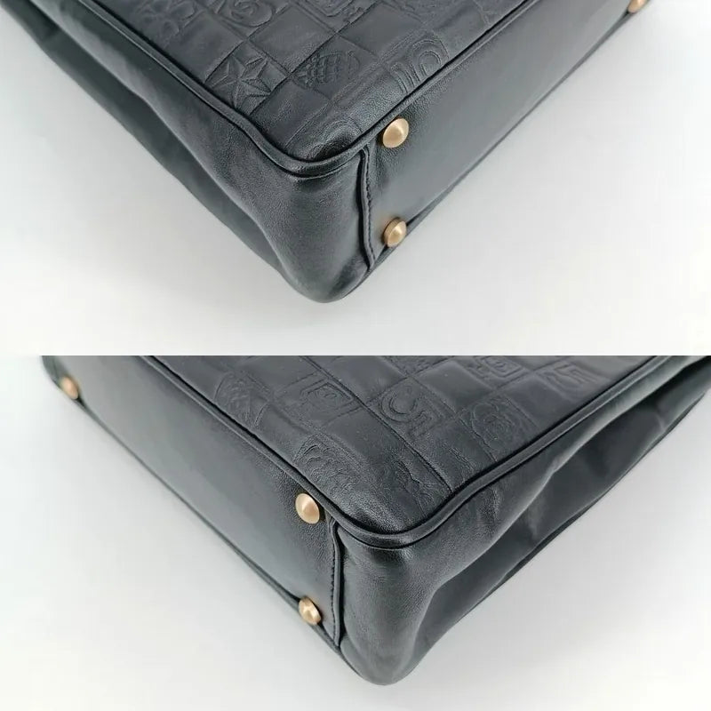 ra372-chanel-vintage-black-lambskin-precious-symbols-embossed-tote-bag