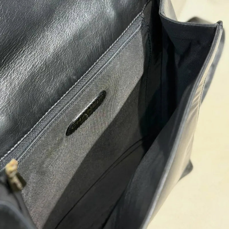 jx064-chanel-vintage-black-lambskin-backpack