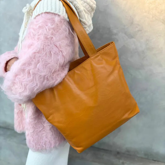 jw563-chanel-vintage-mustard-lambskin-cc-embossed-tote-bag