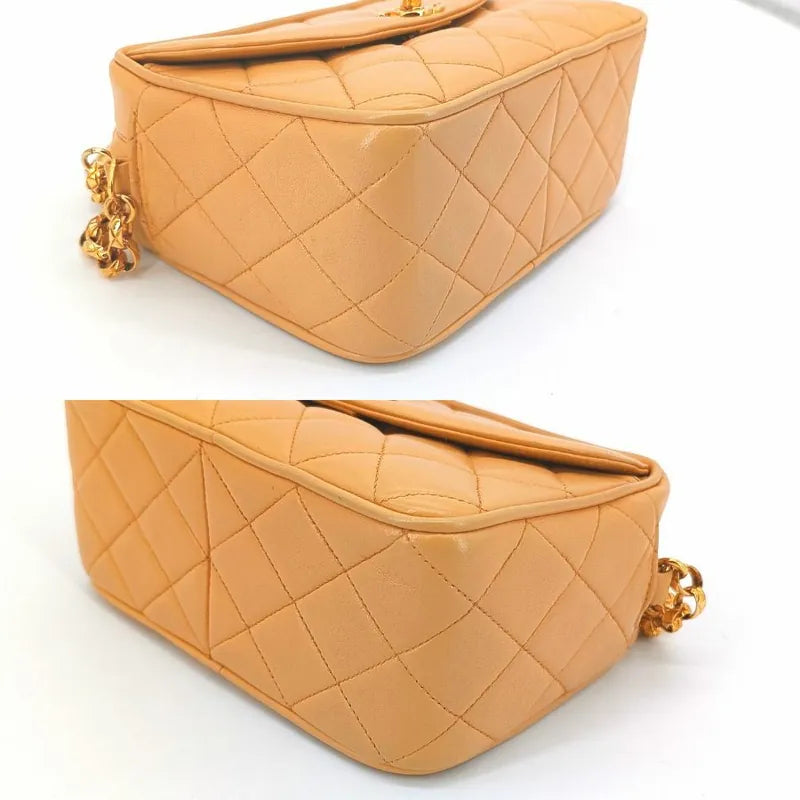 ra199-chanel-vintage-beige-lambskin-gold-chain-camera-bag